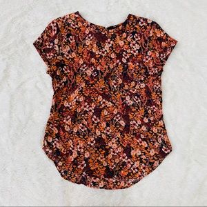 H&M floral blouse.